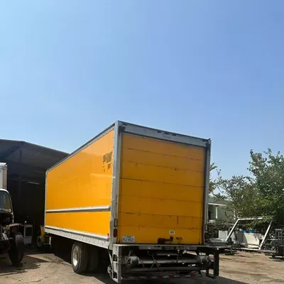 JOMONIE TRUCKING COMPANY