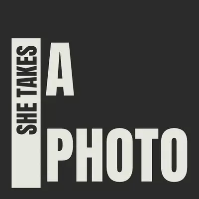 She Takes A Photo