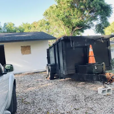 First line cleaning up dumpster
