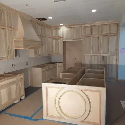 FIRST CLASS CUSTOM CABINETS(trim work,stairs. )