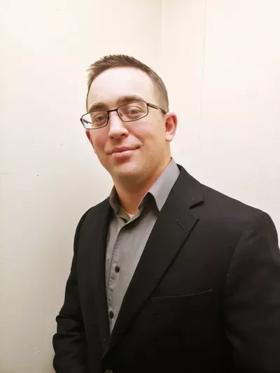 Travis J. Cline