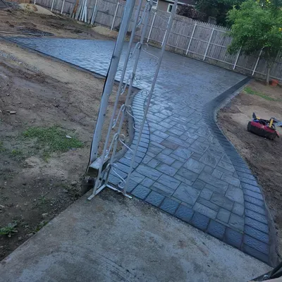 Guzmanlanscaping&construction INC