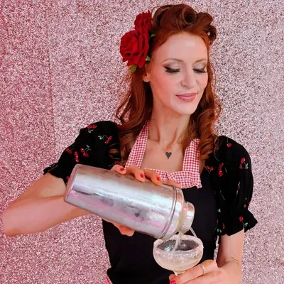 The Redhead with a Shaker