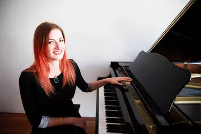 Rebecca M.