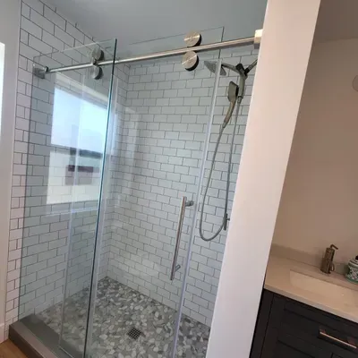 Jlo shower doors storefronts and glass handrails