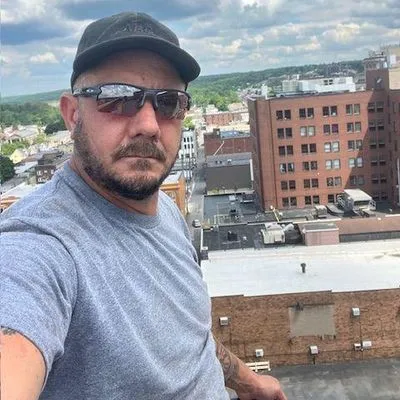 On Top Roofing Property Management LLC