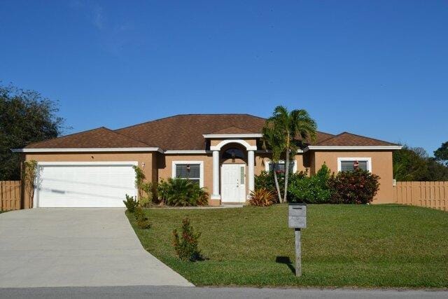 4 Bedroom 3 Bath In Port Saint Lucie FL 34983 for Rent